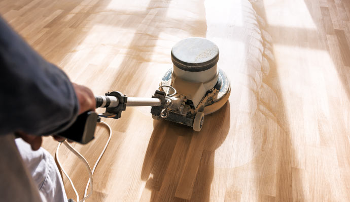 laminate floor cleaning using a machine.