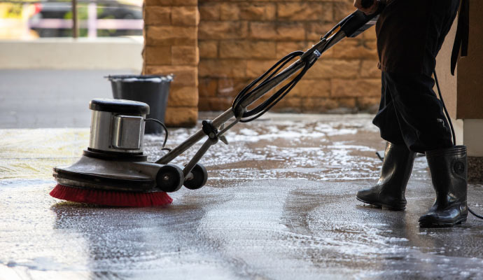 floor cleaning using a scrubber