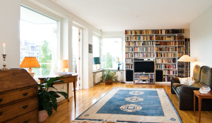 A clean rug on a wooden floor.